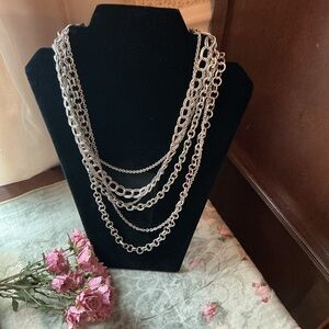 Elegant multi chain  silver tone chunky bib Necklace.